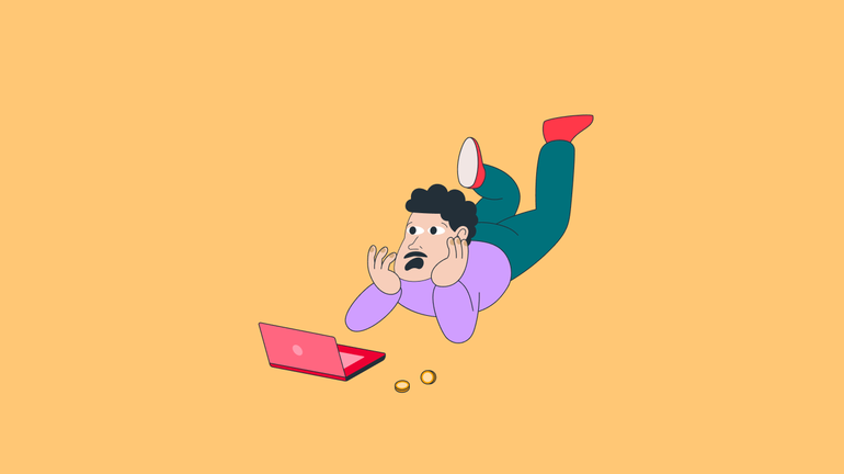Mann mit Laptop und Münzen