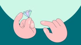 Zwei Hände mit Diamant